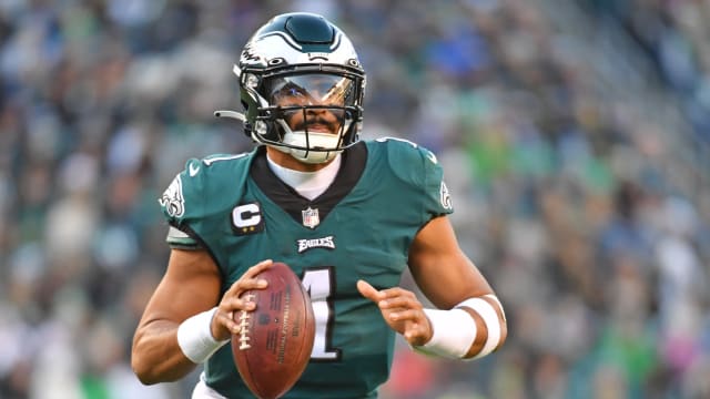 Eagles quarterback Jalen Hurts prepares to throw a pass.